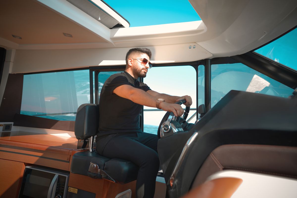 Captain at a yacht helm