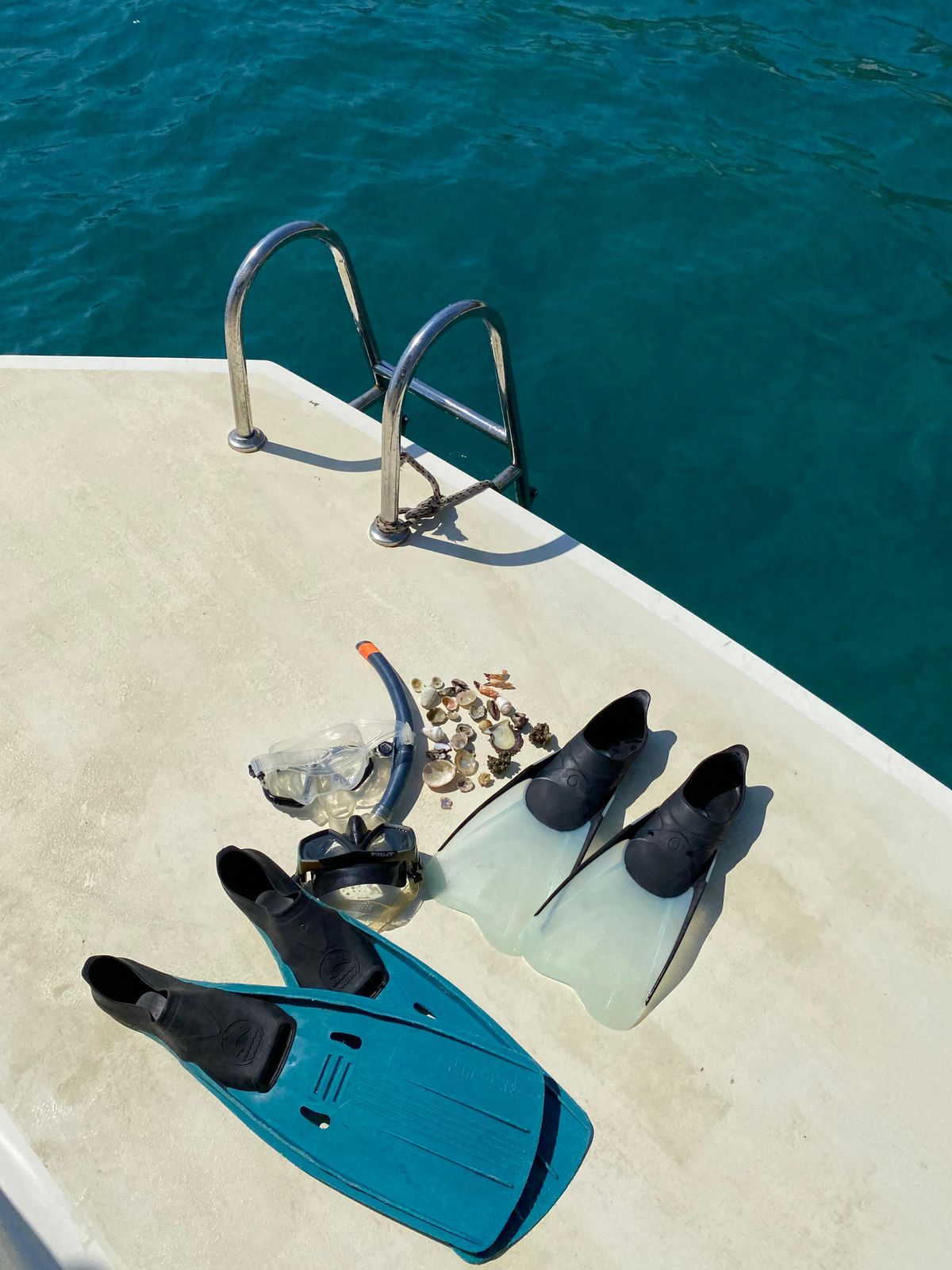 Snorkeling fins and masks on a boat